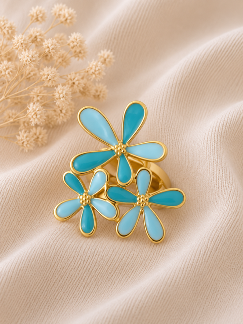 Bague dorée fleurs bleues